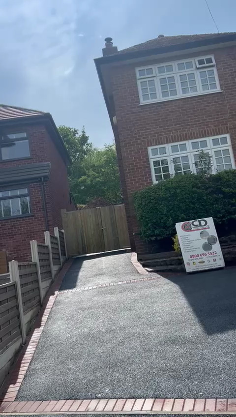 Long tarmac driveway in Northwich, Cheshire.